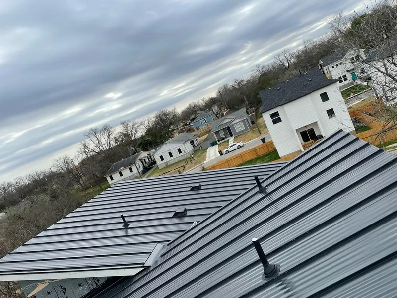 Standing seam metal roof panels with vents for Skylight Repair in Groveton